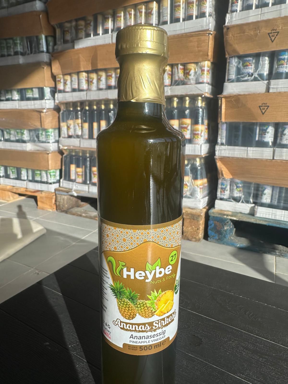 Pineapple Vinegar 500 ml in a dark bottle with gold label and pineapple illustration