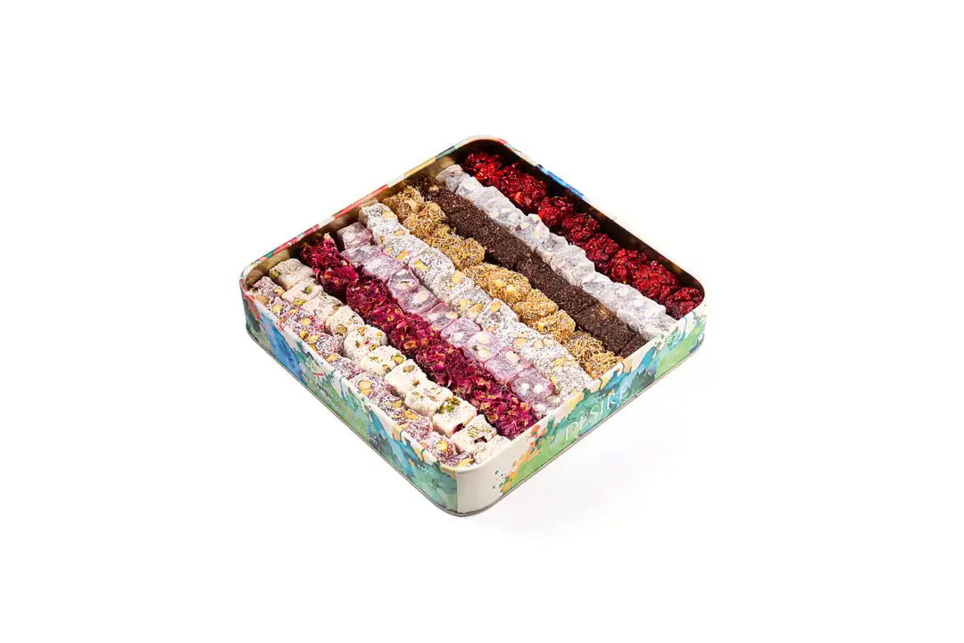 Open metal tin with several rows of differently styled Turkish Delight pieces