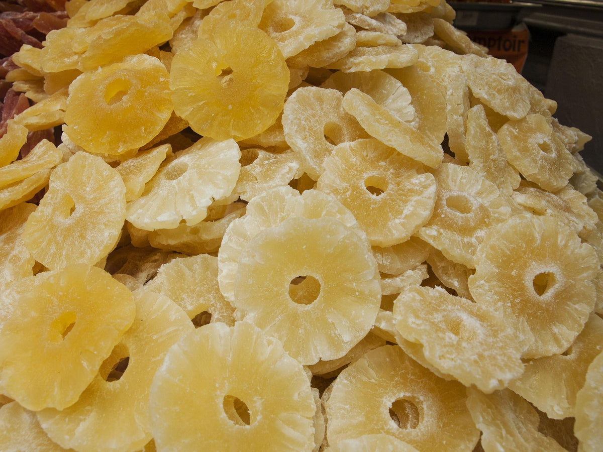 Close-up of yellow dried pineapple rings and pieces