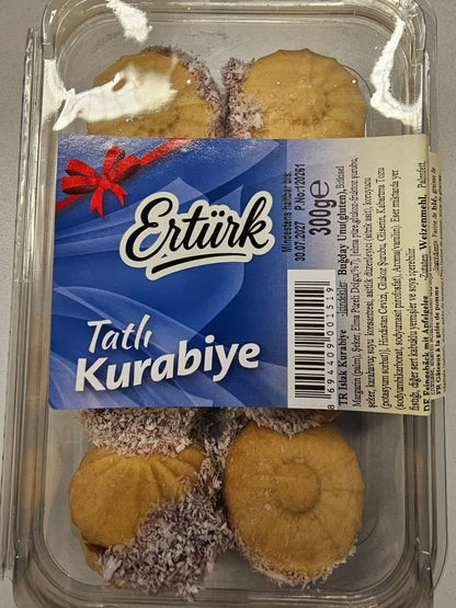 Ertürk Islak Kurabiye with red filling and coconut flakes in a transparent 300 g pack