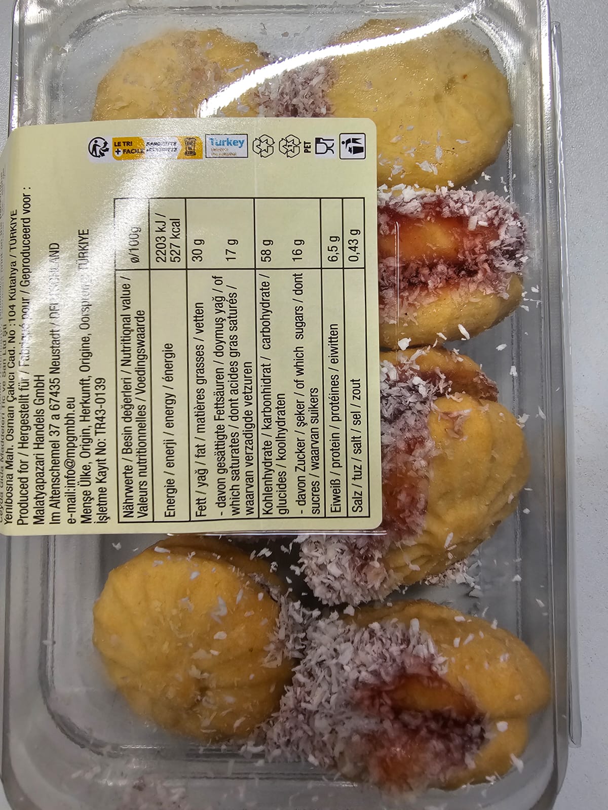 Ertürk Islak Kurabiye with coconut flakes and visible nutrition label