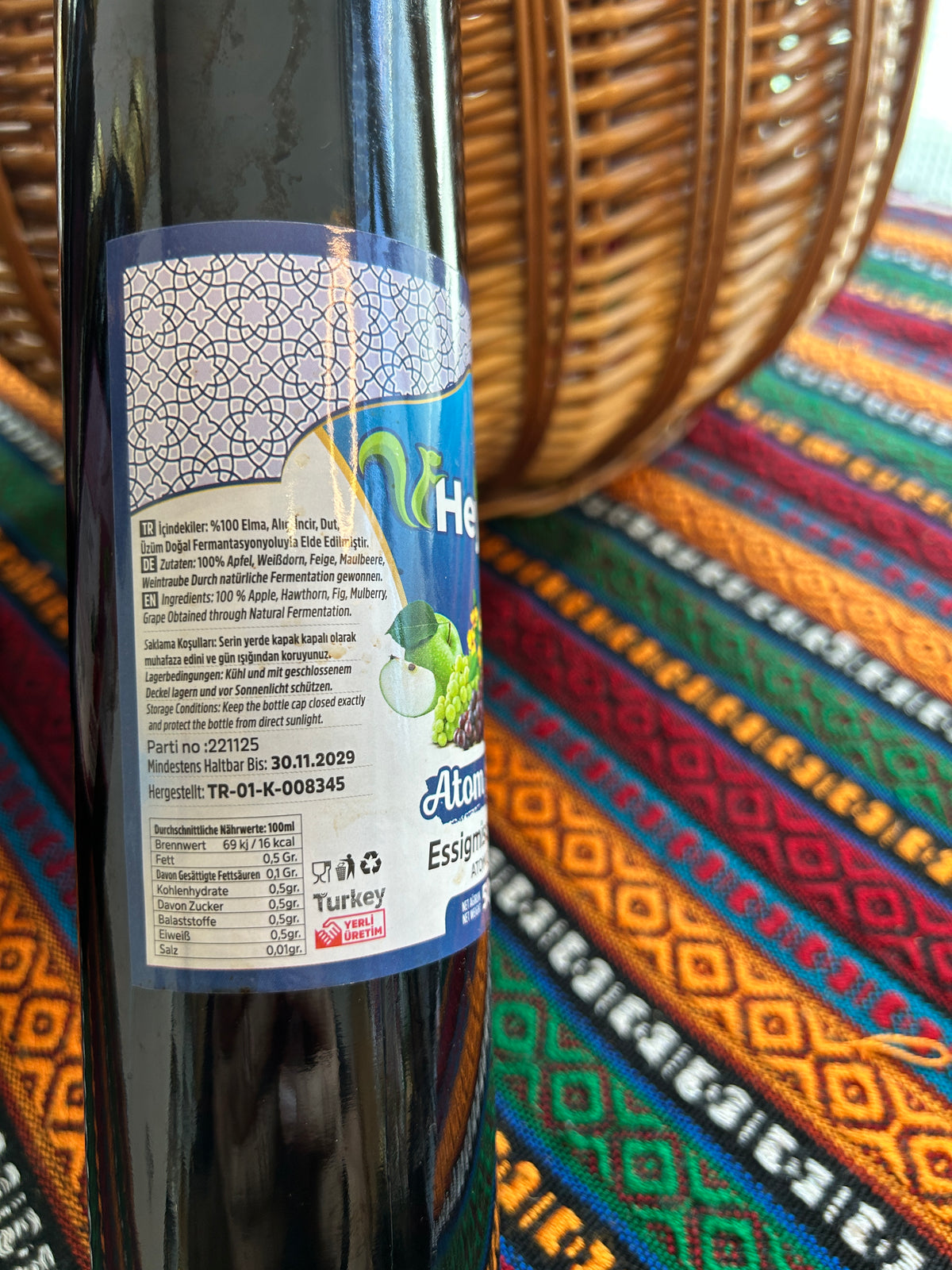Close-up of Atom Vinegar Mix label showing fruit ingredients and nutritional values