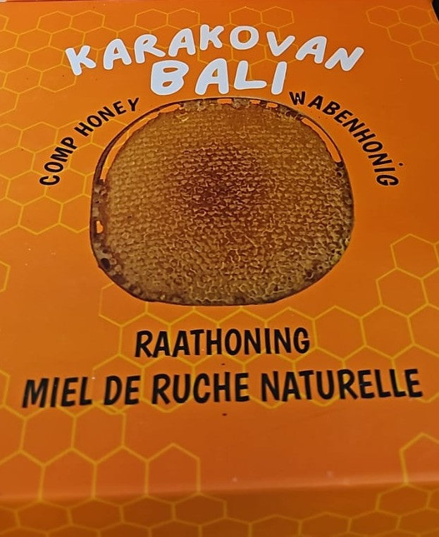 Orange Karakovan Balı cardboard lid with a printed photograph of a honeycomb