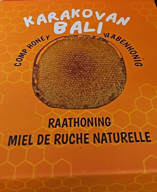 Orange Karakovan Balı cardboard lid with a printed photograph of a honeycomb