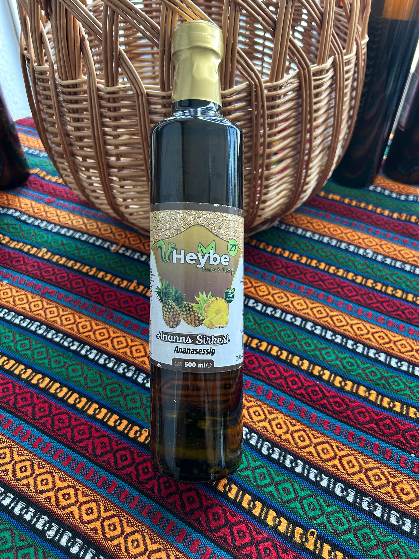 Pineapple Vinegar 500 ml in a dark bottle with gold label and pineapple illustration