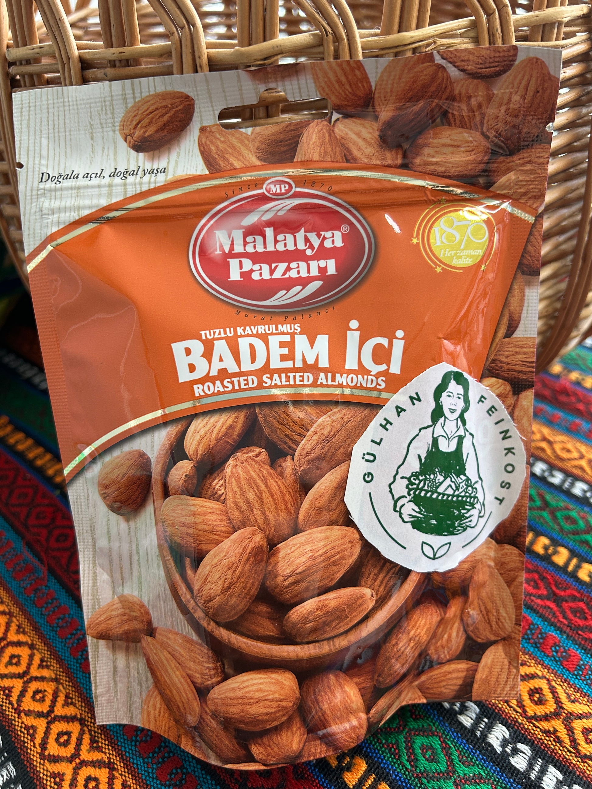 Malatya Pazarı roasted salted almonds 180 g in orange packaging