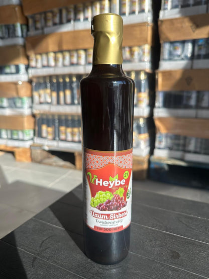 Grape Vinegar 500 ml in a dark bottle with red label and grape illustration