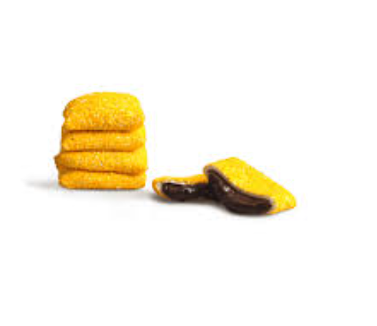 Yellow rectangular Turkish Delight pieces with a coconut-coated surface and visible dark filling on a white background