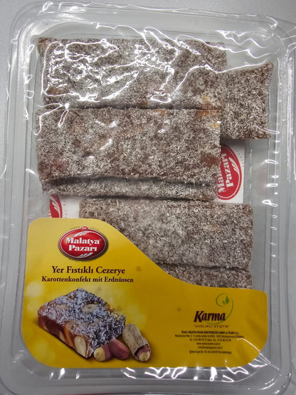 Malatya Pazarı Peanut Cezerye pieces coated with coconut in a transparent pack
