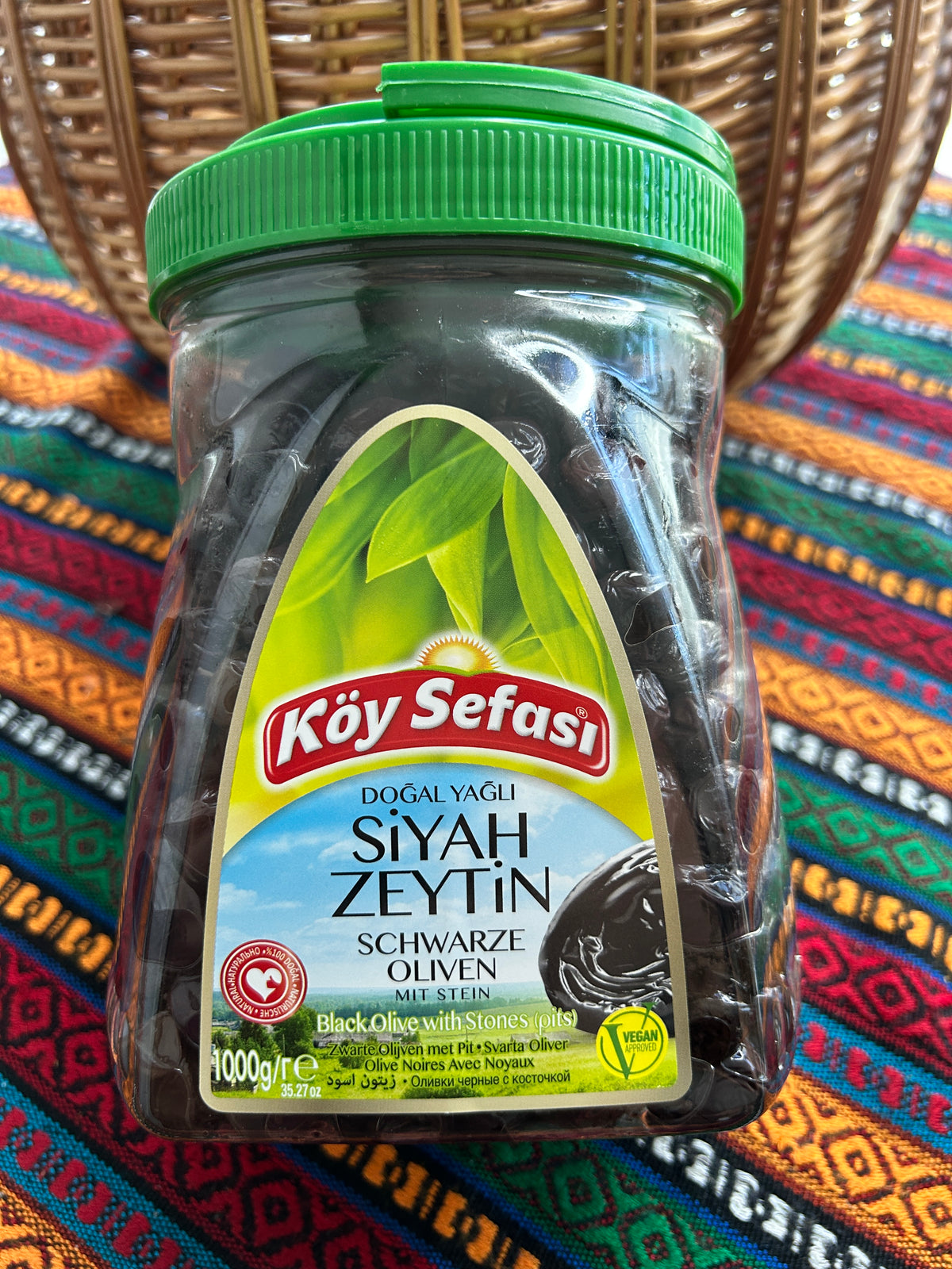 Köy Sefası black olives with stones in transparent 1 kg container with green lid