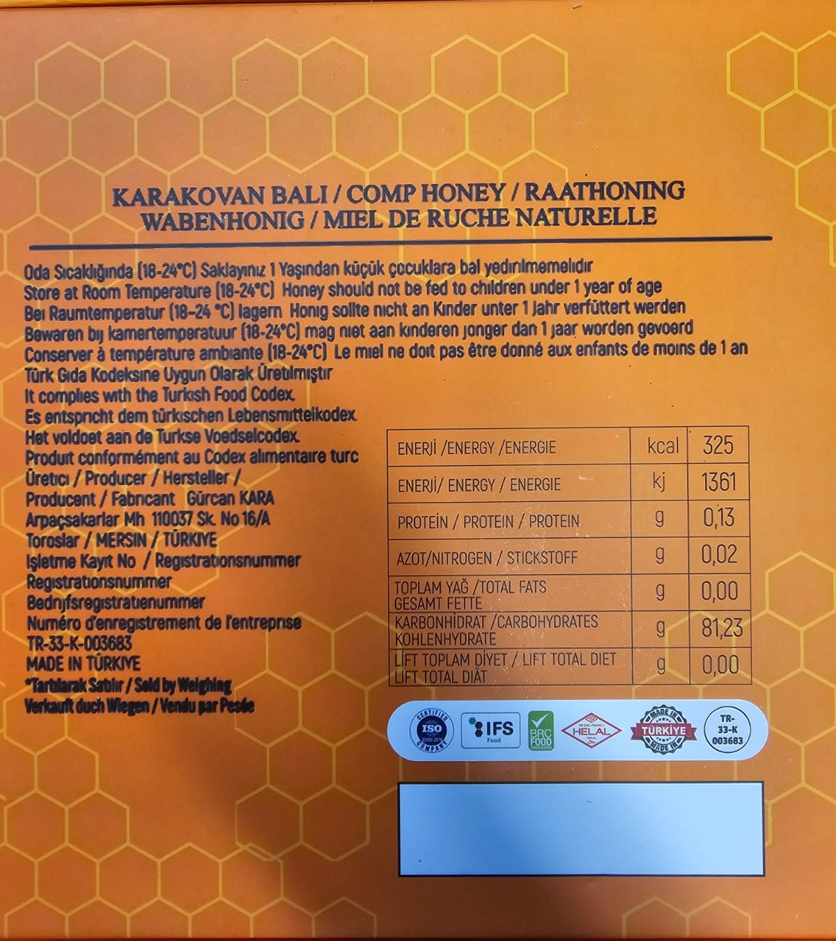 Underside of the Karakovan Balı box showing producer details, storage guidance and a nutrition table