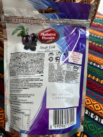 Back of the dried black plum package showing ingredients and nutritional values