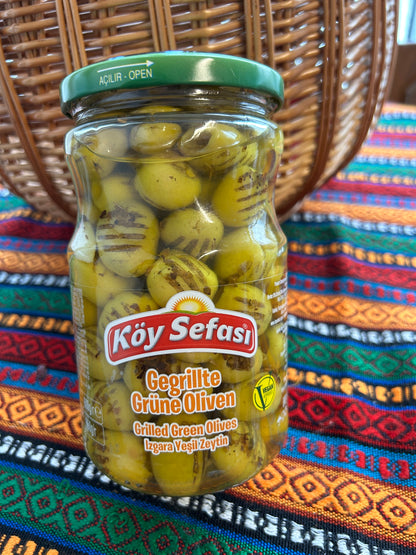 Köy Sefası grilled green olives in a glass jar with green lid and visible front label
