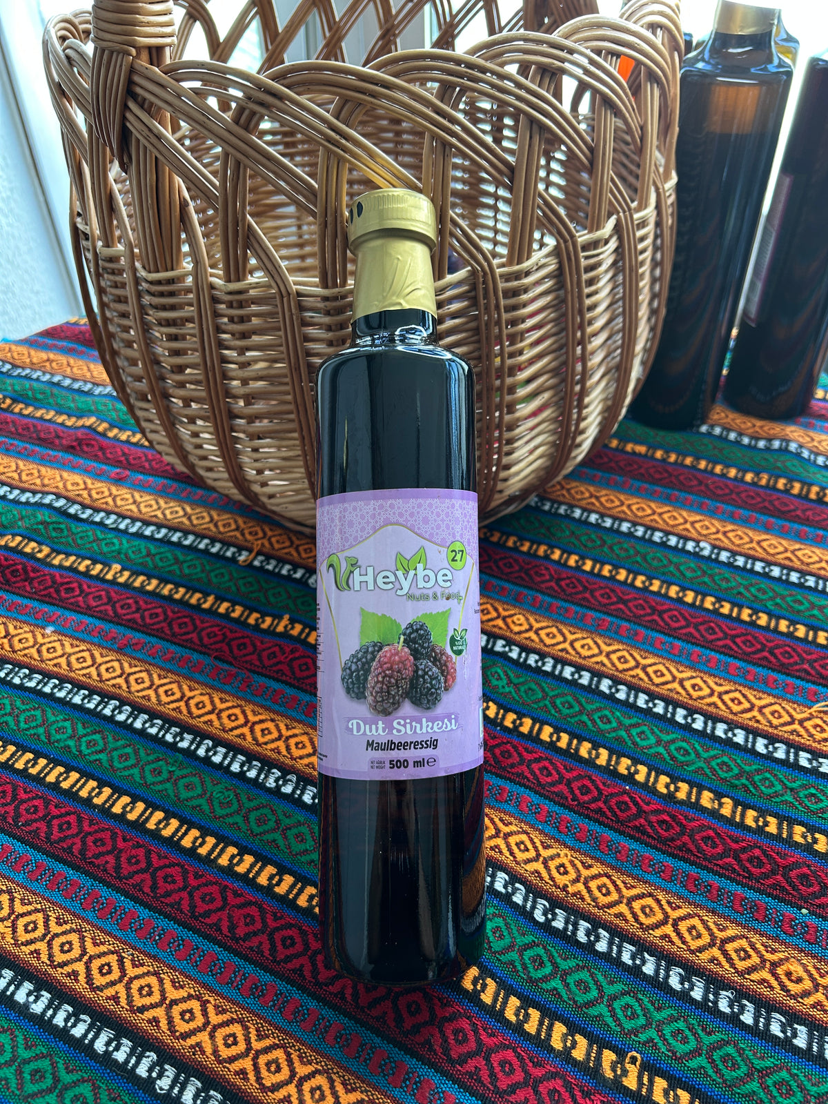 Mulberry Vinegar 500 ml in a dark bottle with purple label and mulberry illustration