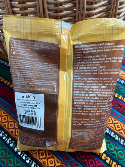 Back of the roasted cashew package showing ingredients, allergens and storage information